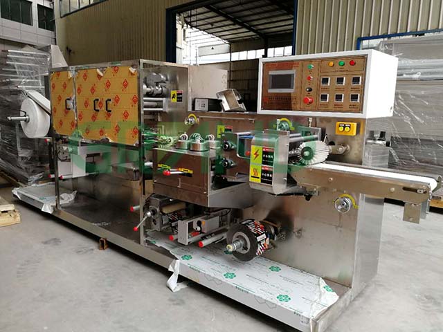 Islak doku paketleme makinesi